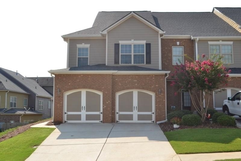 ADORABLE TOWNHOME WITH PRIVACY FENCED BACKYARD!