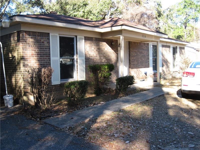 With a brick and vinyl exterior, this home is easy