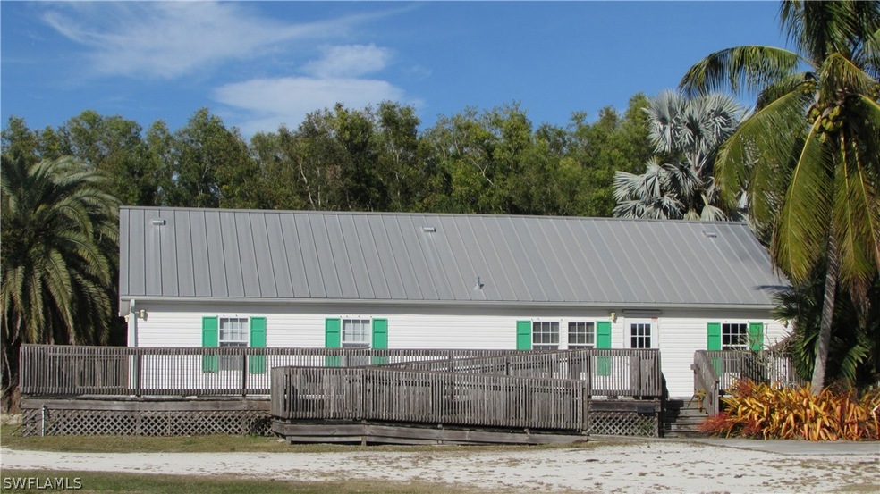 11660 Stringfellow Rd, Bokeelia, FL 33922 - photo 1