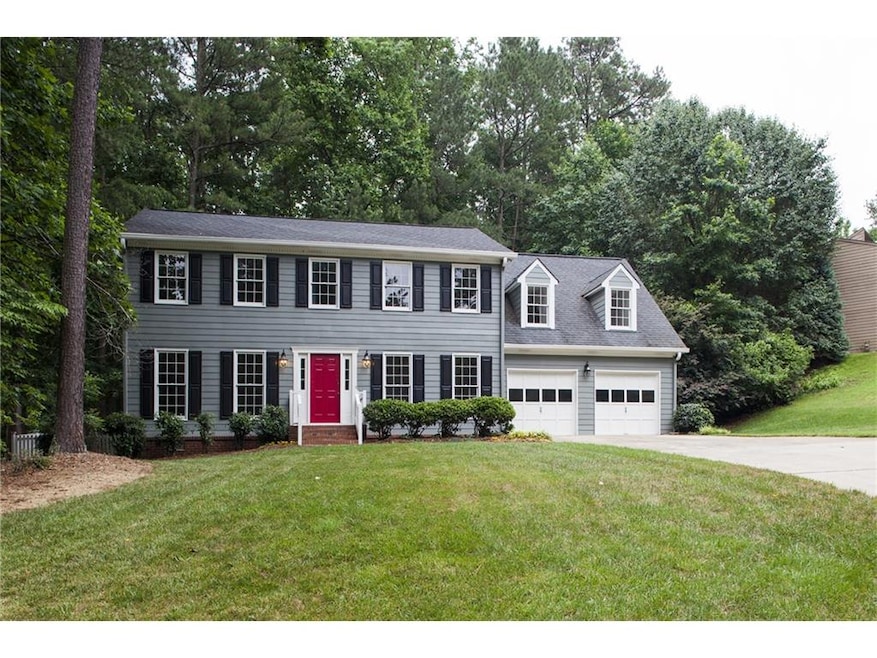 Handsome traditional home with level driveway, woo
