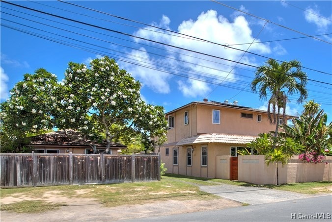 Main house is two-stories and cottages are to the