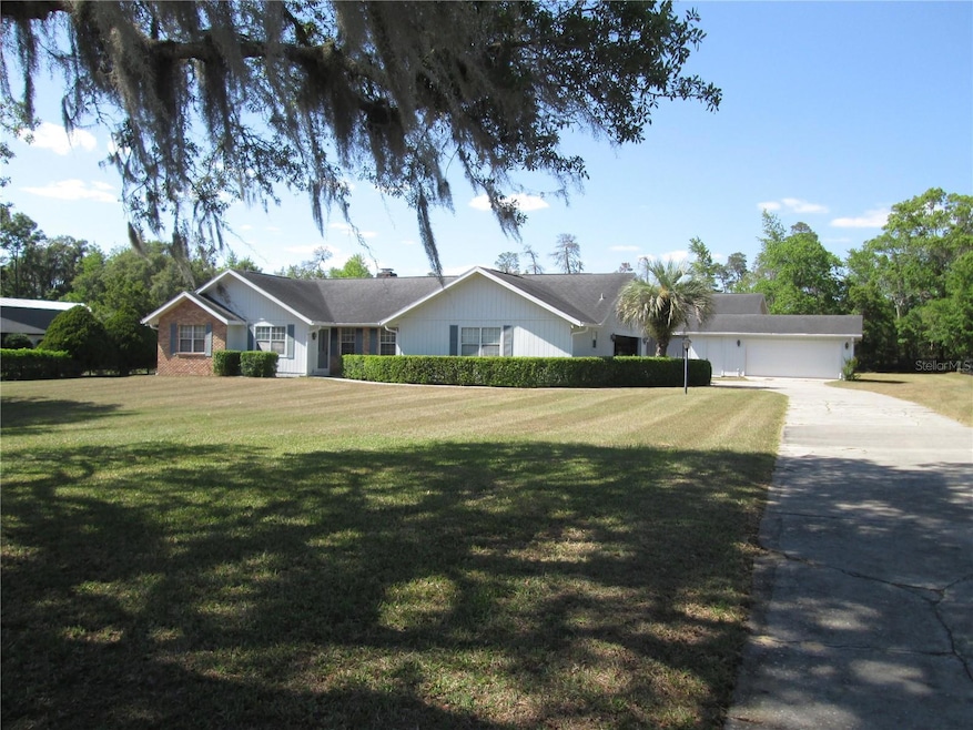 One acre fenced with spacious front lawn
