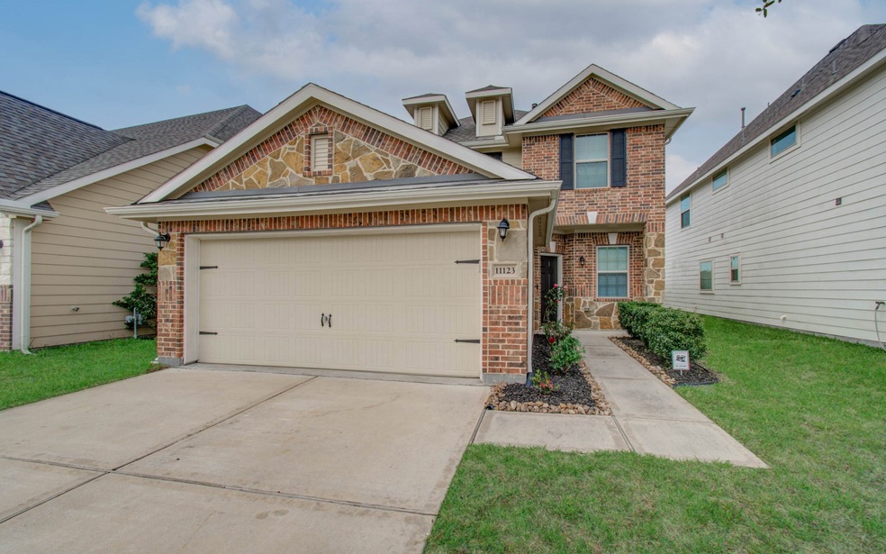 11123 Sun River Falls Dr, Humble, TX 77396 - photo 1