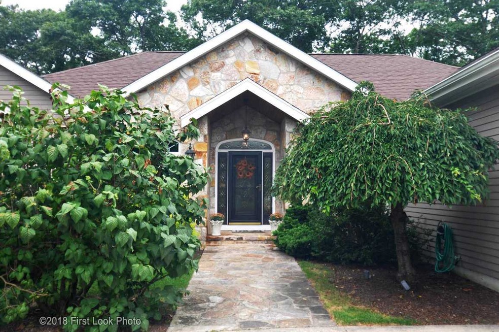 FRONT DOOR WITH BEAUTIFUL STONE WORK