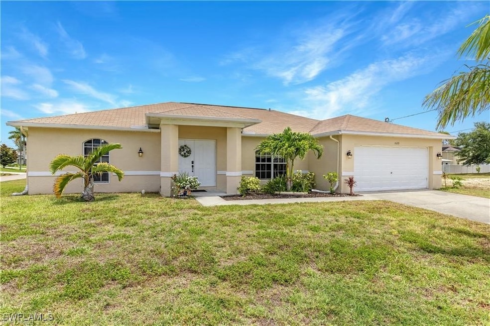 Single story home featuring stucco siding, concret