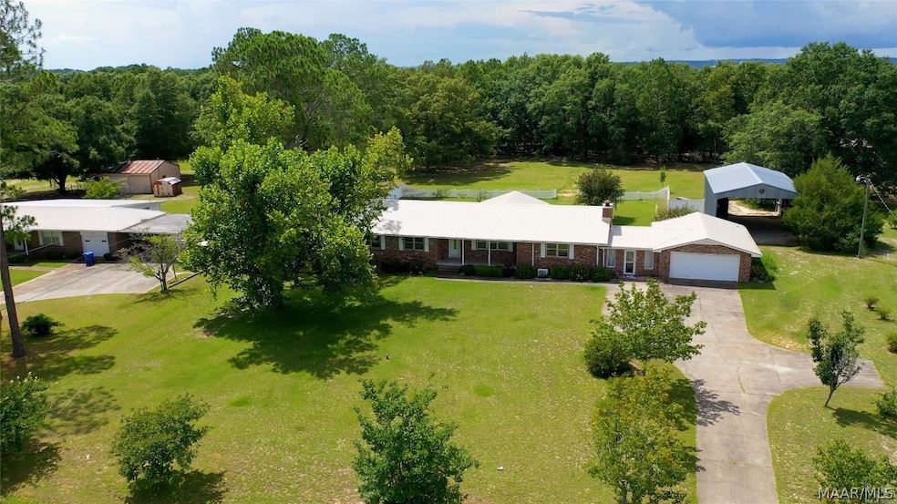 AERIAL PHOTO OF HOME AND RV COVER