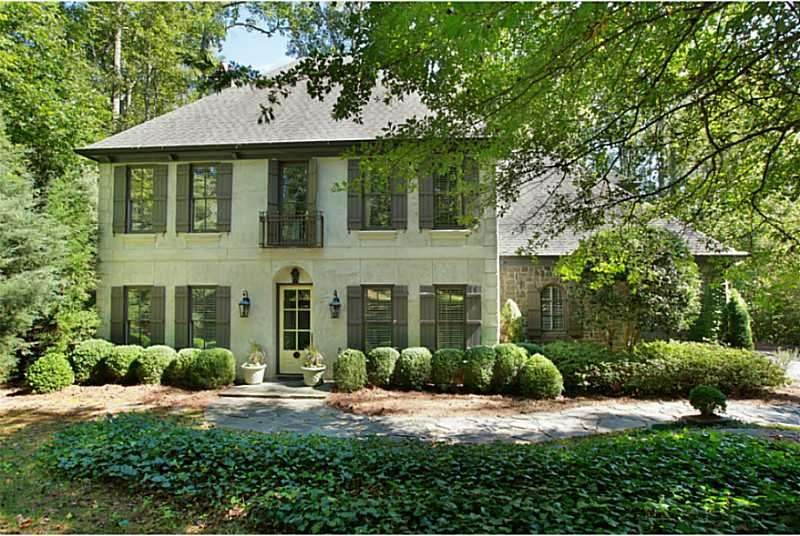 Exterior Front. Custom home privately situated on 