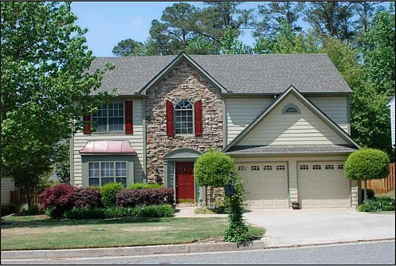 Facade/Exterior Front. Inviting exterior with stac