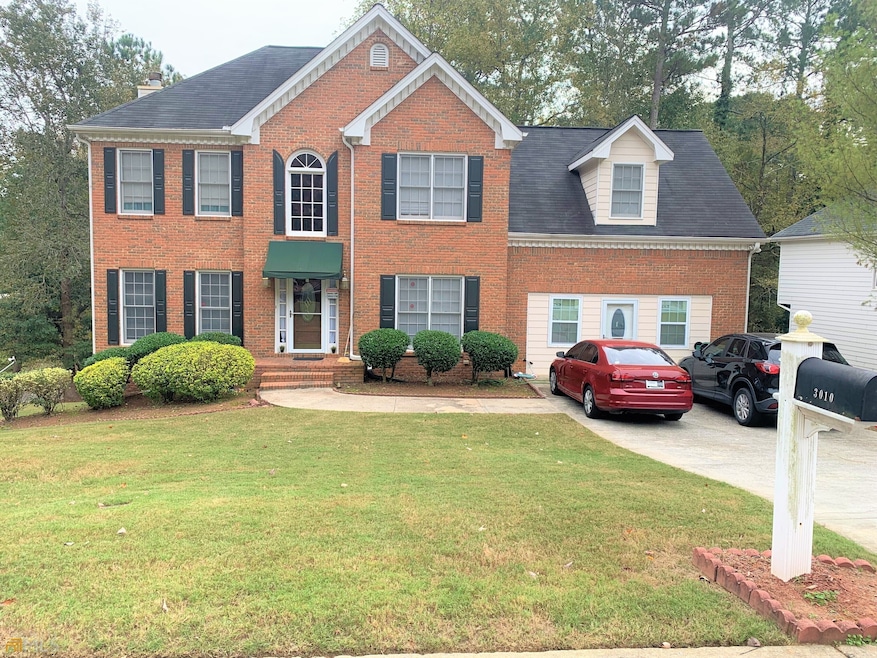 3010 Royal Creek Way SW, Lilburn, GA 30047 - photo 1