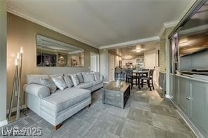 Living area featuring crown molding