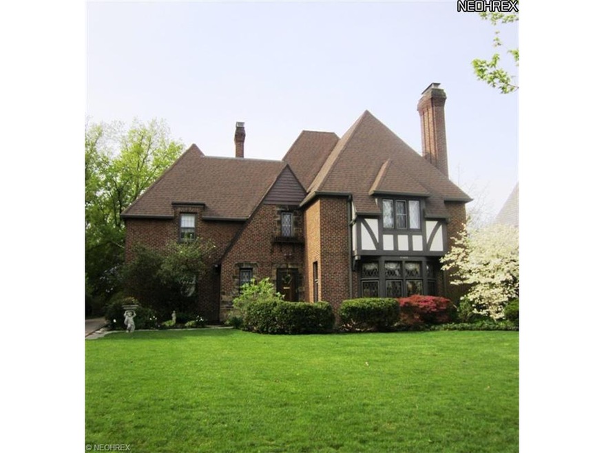 WELCOME TO THIS BEAUTIFUL BRICK TUDOR LOCATED   AT
