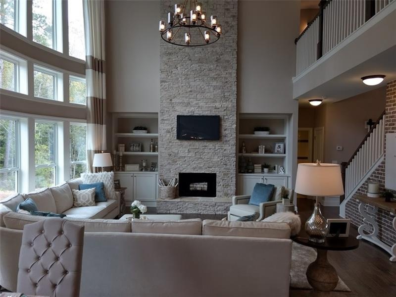 2 Story Family room with bowed wall of windows (ph