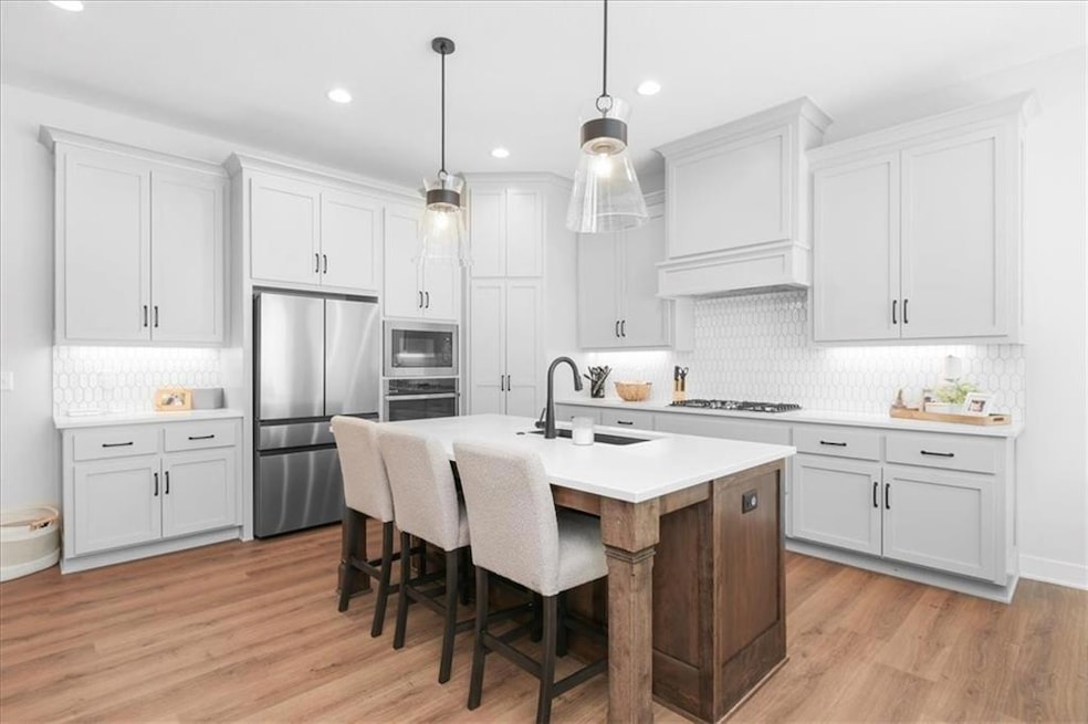 1161 SW Whitby Dr, Raymore, MO 64083 - photo 1