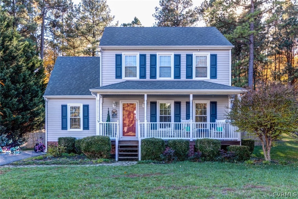 Well landscaped yard surrounding lovely like-new h