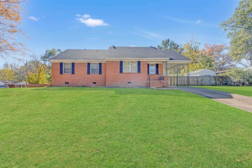 View of front of property with a front yard