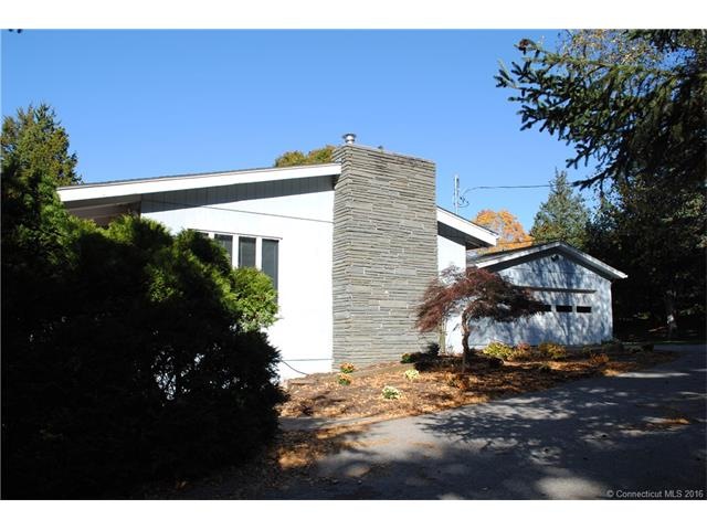 Beautiful stone chimney and gorgeous Japanese red 