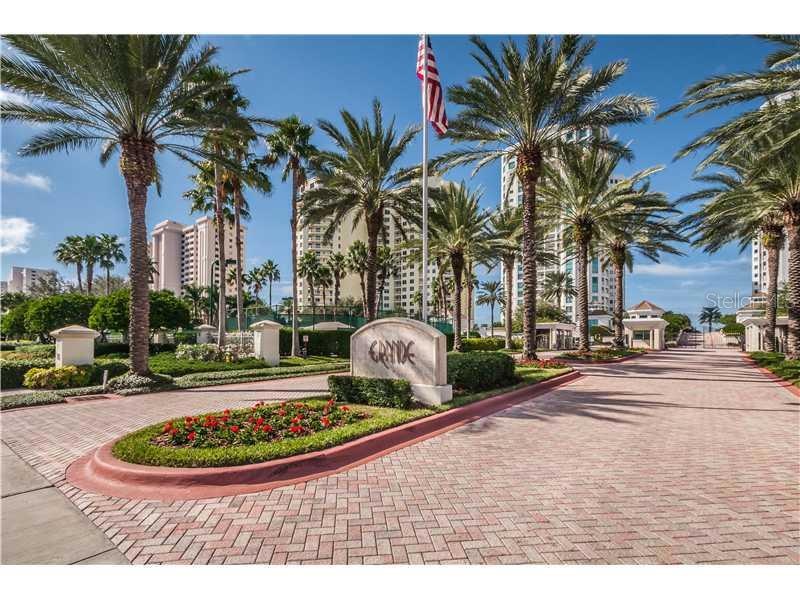 Exterior Front - Palm lined entry to the Grande!