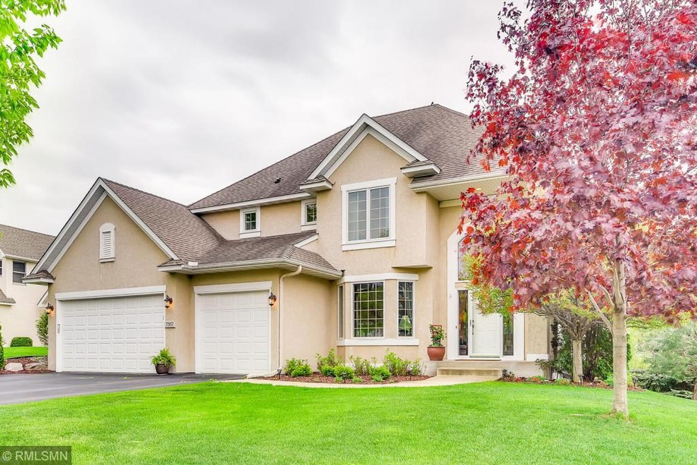 Gorgeous Stucco exterior with lovely landscaping t