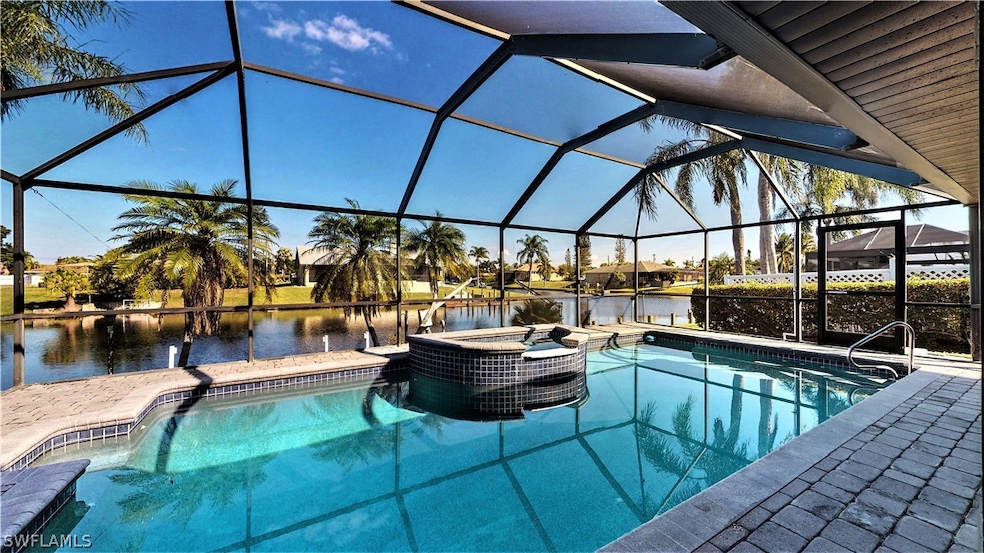 Beautiful heated pool with waterfall jacuzzi overlooking 100' Santa Fe Canal.