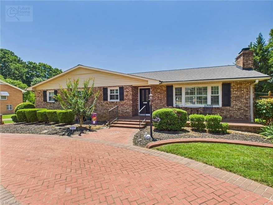 Front of home - circle brick drive