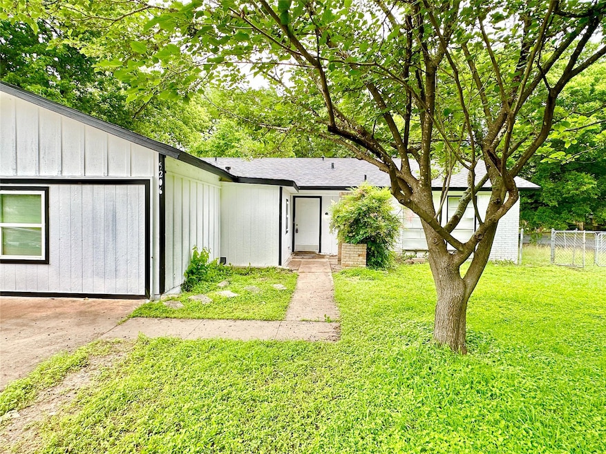 View of front facade with board and batten siding