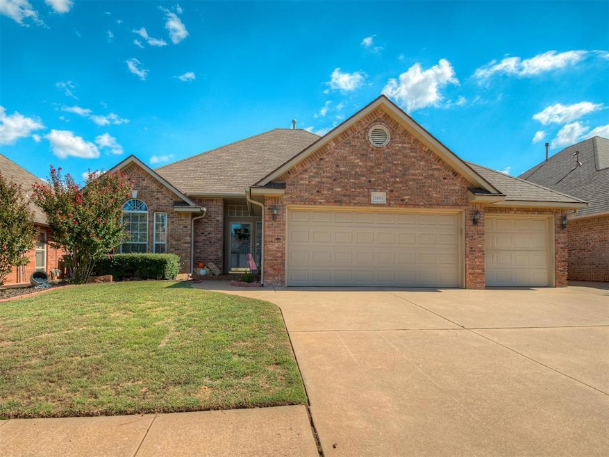 View of front of property with a garage and a fron