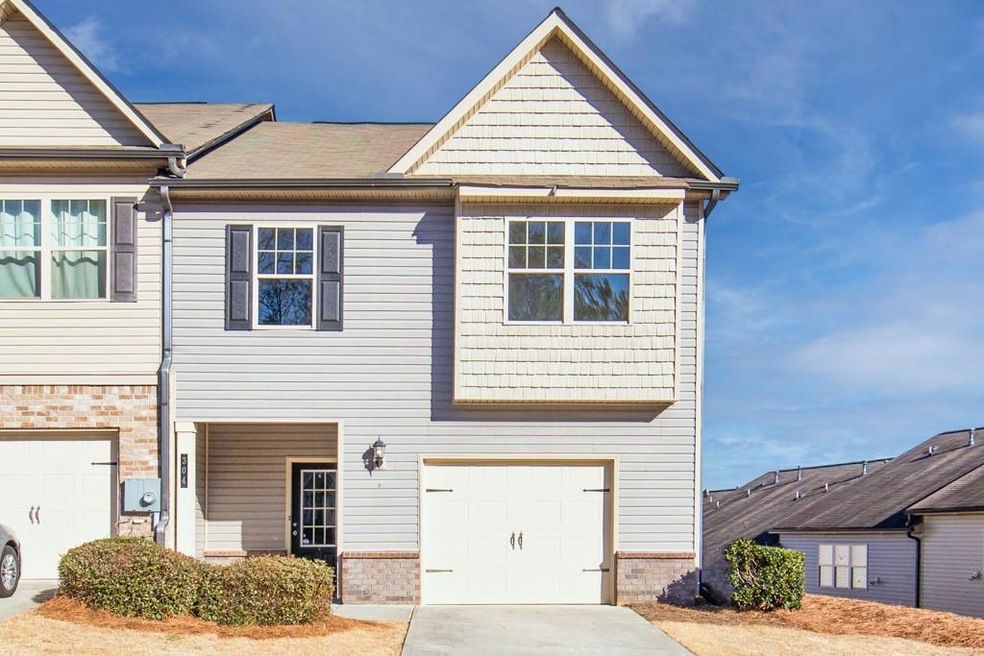 View of front of property with a garage
