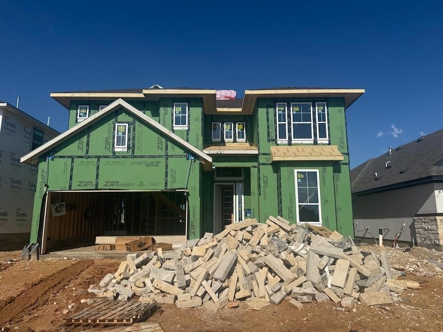 Property under construction with stucco siding