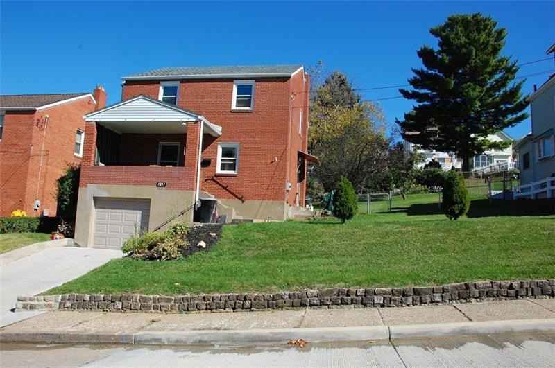 Front Exterior showing double lot.