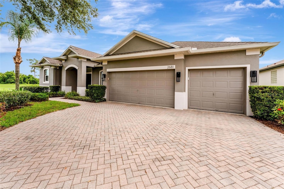 3-car garage with built in shelving