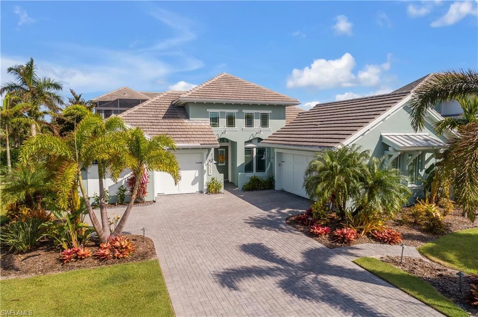 Front view of property featuring a 3 car garage an