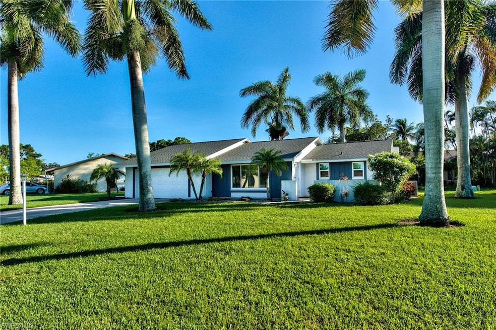Front w/ Royal Palms