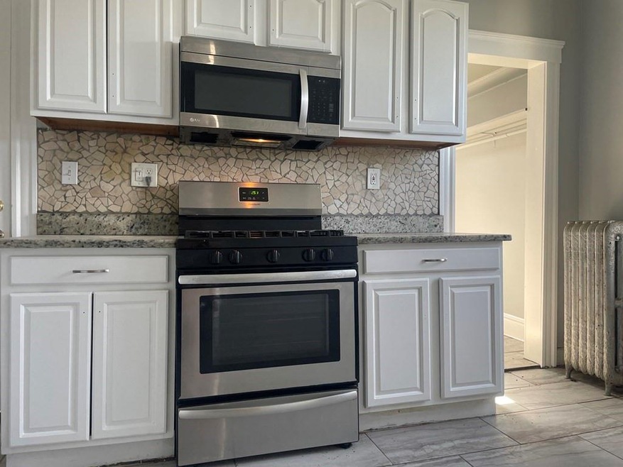 31 Woolson St unit 3, Mattapan, MA 02126 - photo 1