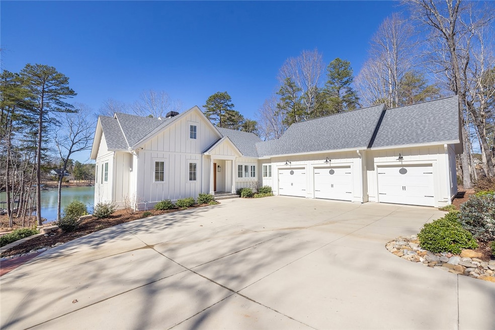 This stunning four-bedroom, four and a half-bath,