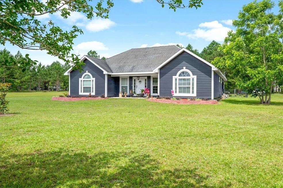 This beautifully updated, one story, ranch style h