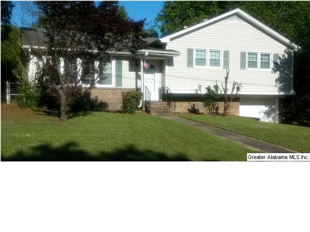Low maintenance vinyl siding with brick foundation