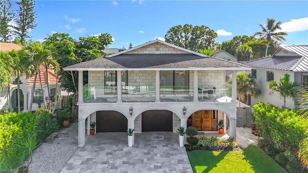 10242 Vanderbilt Dr, Naples, FL 34108 - photo 1