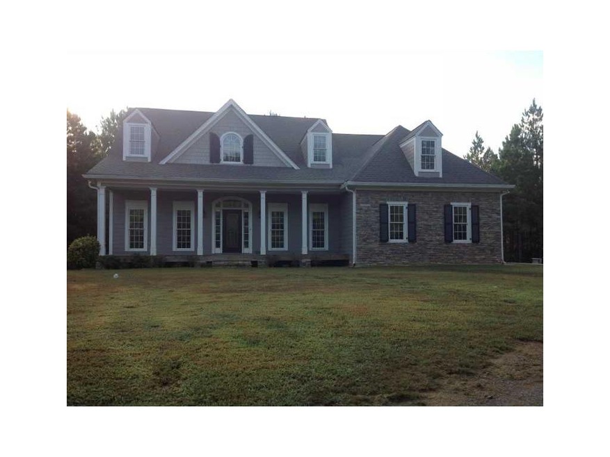 Exterior Front. Nestled on 7.9 acres!