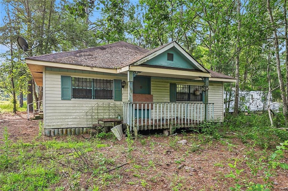 Charming fixer-upper with great potential! Just ne