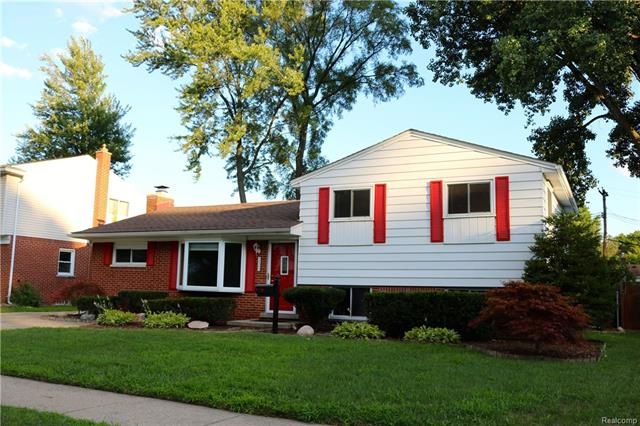 THIS LARGE (1,676 SQ FT) & WELL MAINTAINED 3 BEDROOM BRICK TRI-LEVEL WITH 2 FULL BATHS IS LOCATED WITHIN THE 