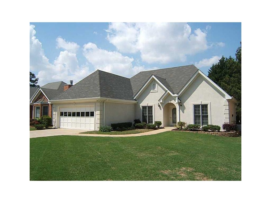 Exterior Front. Built 1991. Level front yard, gent