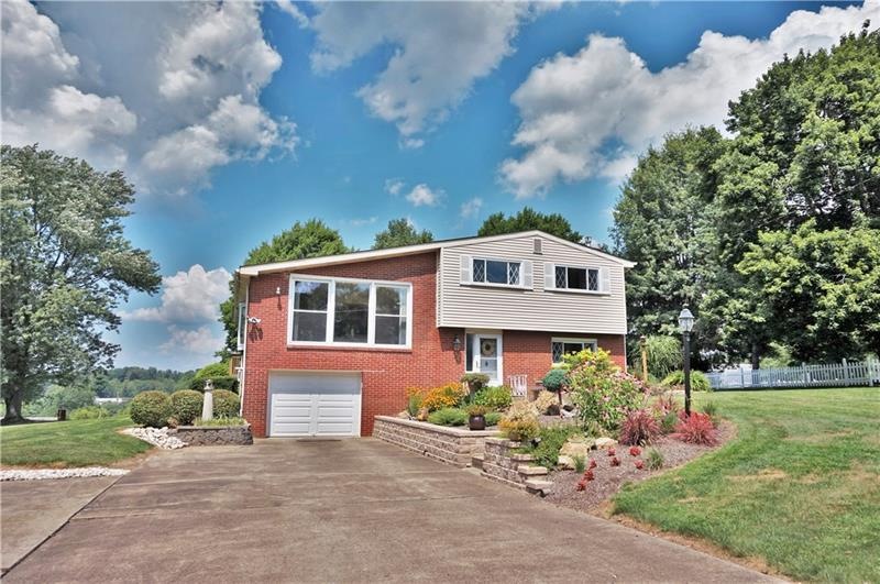 Lots of curb appeal and landscaped to perfection!