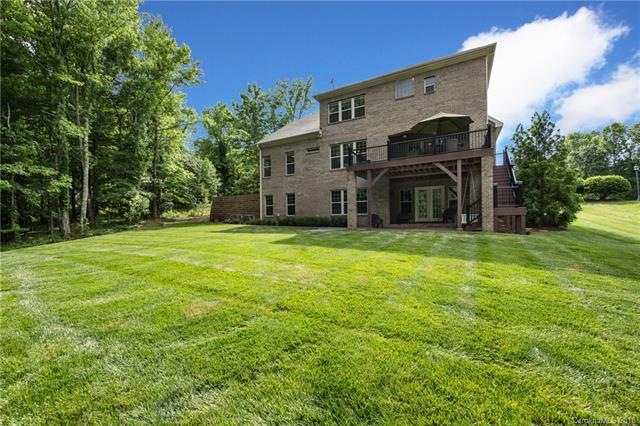 Backyard offers plenty of space for a pool, outdoo