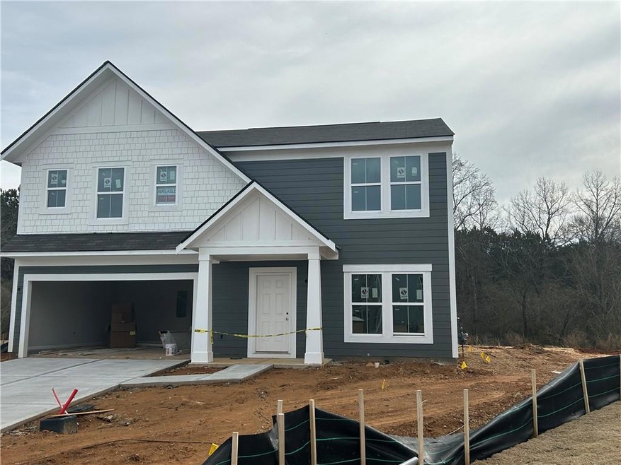 View of front of property with a garage
