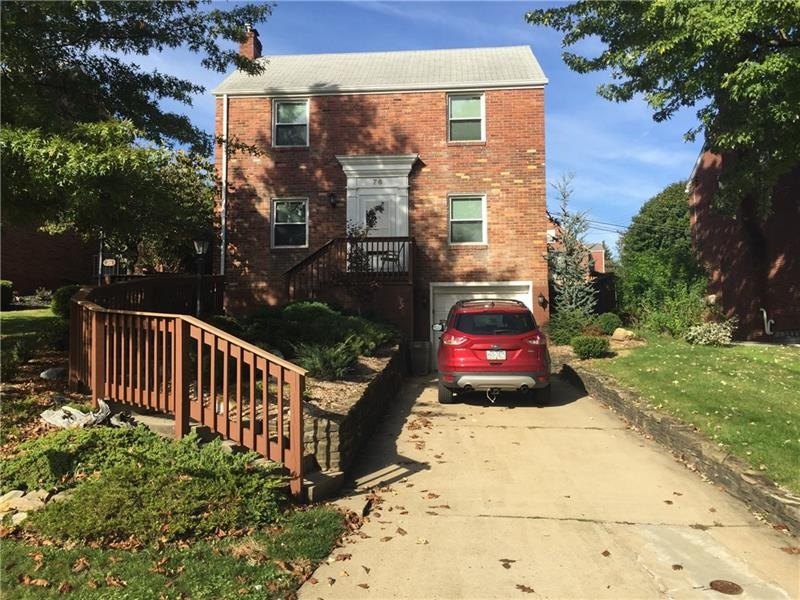 This well-built two story has a nicely landscaped 