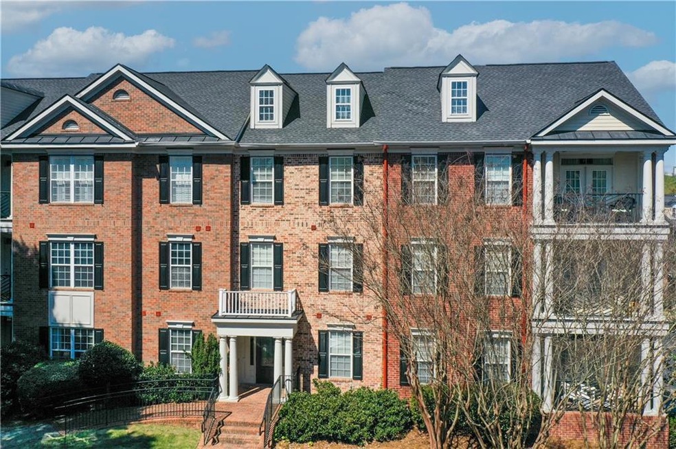 Beautiful front view of this 4 sided brick condo