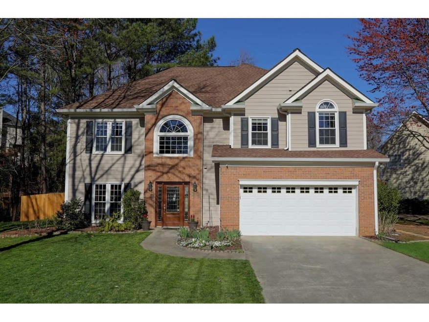 Lake front home with brick and hardi plank siding 