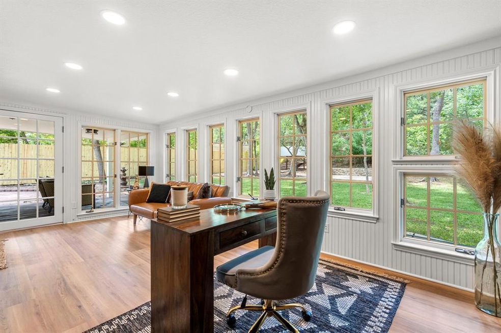 This sunroom makes the perfect home office or seco