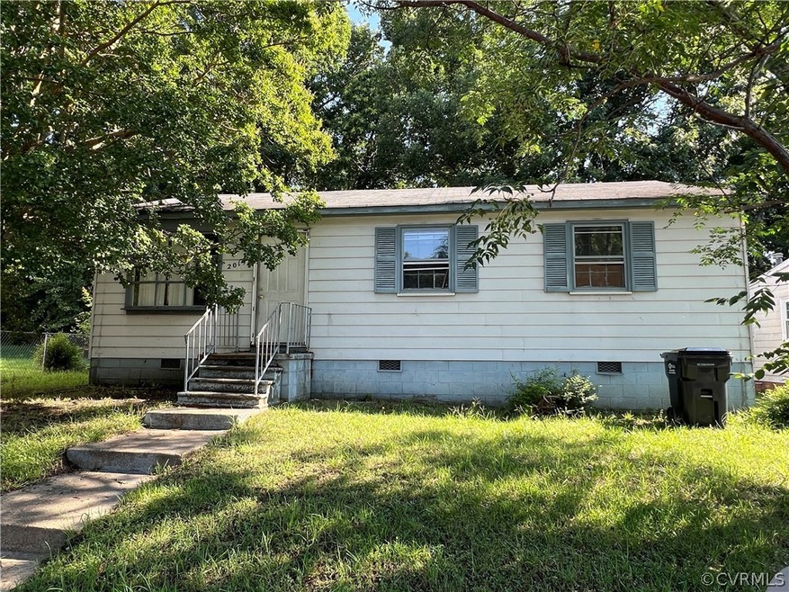 View of front of property with a front yard