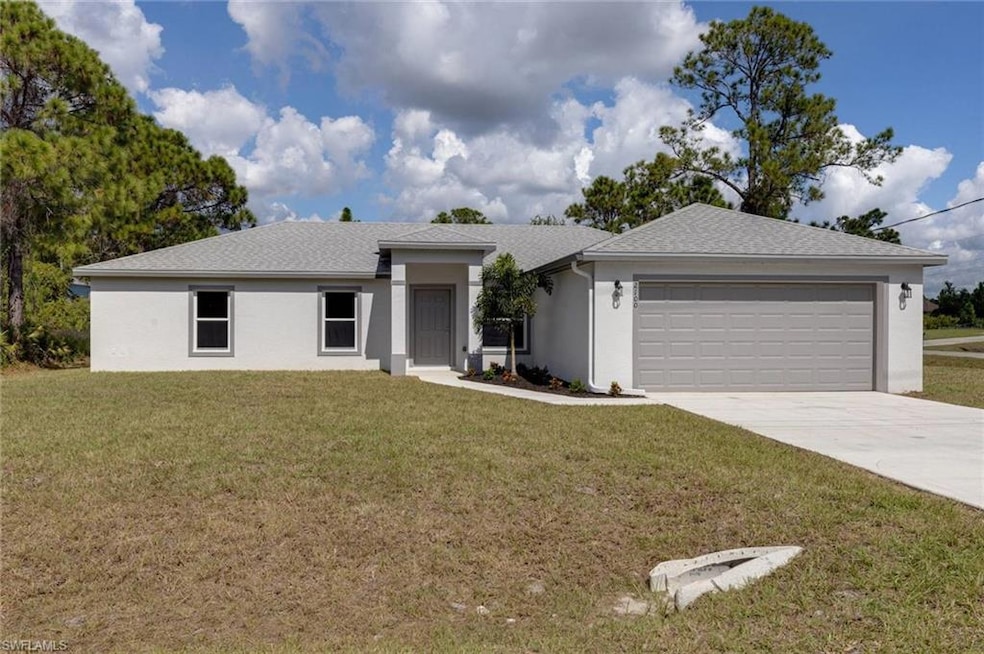 2100 W 15th St, Lehigh Acres, FL 33972 - photo 1